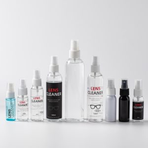 Spray lens cleaner